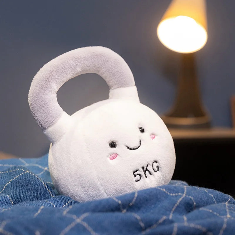 Kawaii plush toy kettlebell with a smiley face on a blue surface