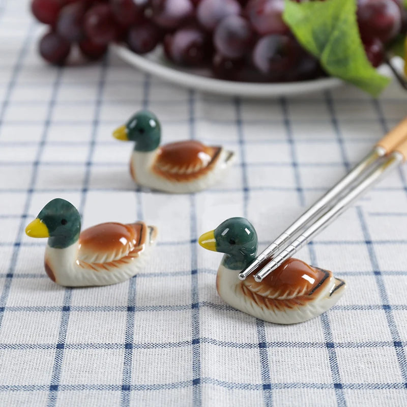 Three duck shaped kawaii chopsticks holders