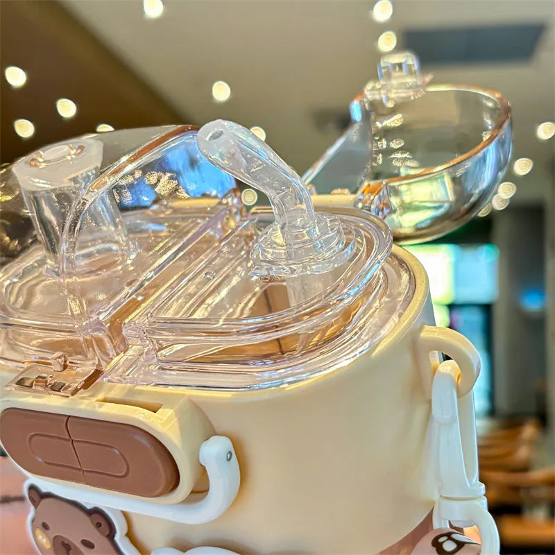 Clear plastic lid on a kawaii mug with a blurred indoor background