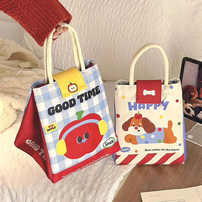 Two small kawaii bags with cartoon designs and text on a wooden surface.