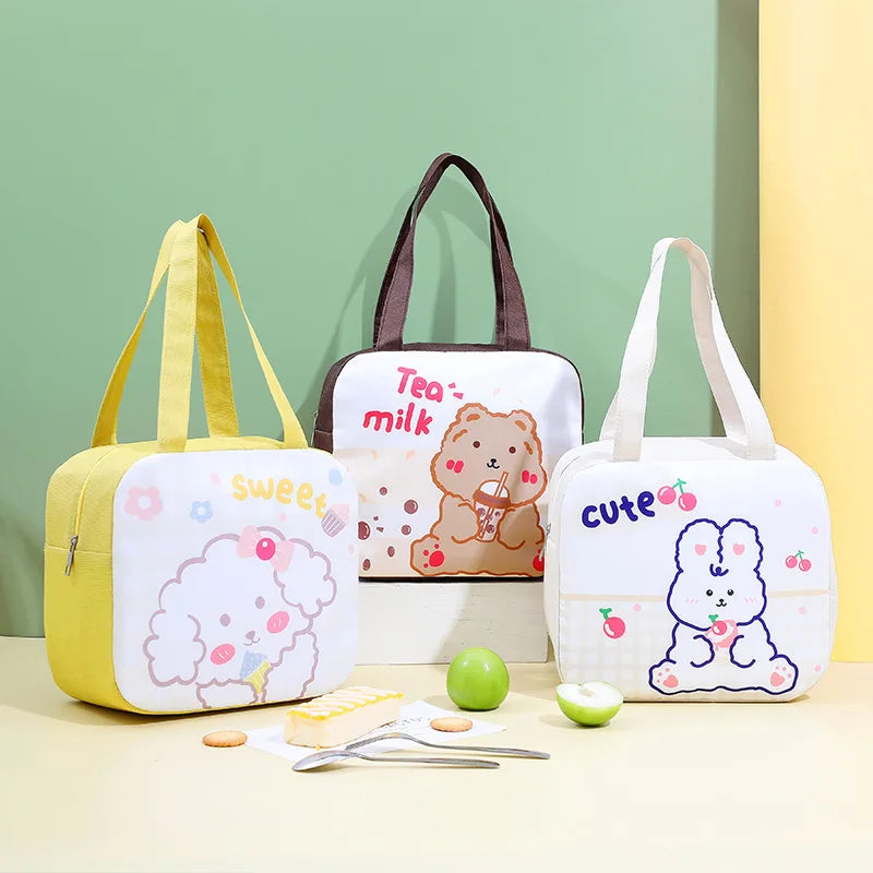 Three cartoon-themed kawaii bags with colorful designs on a light green background