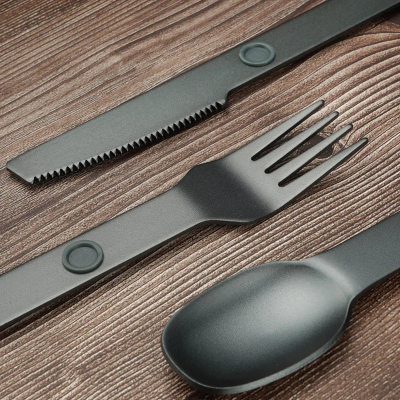 Close up of a set of black kawaii utensils
