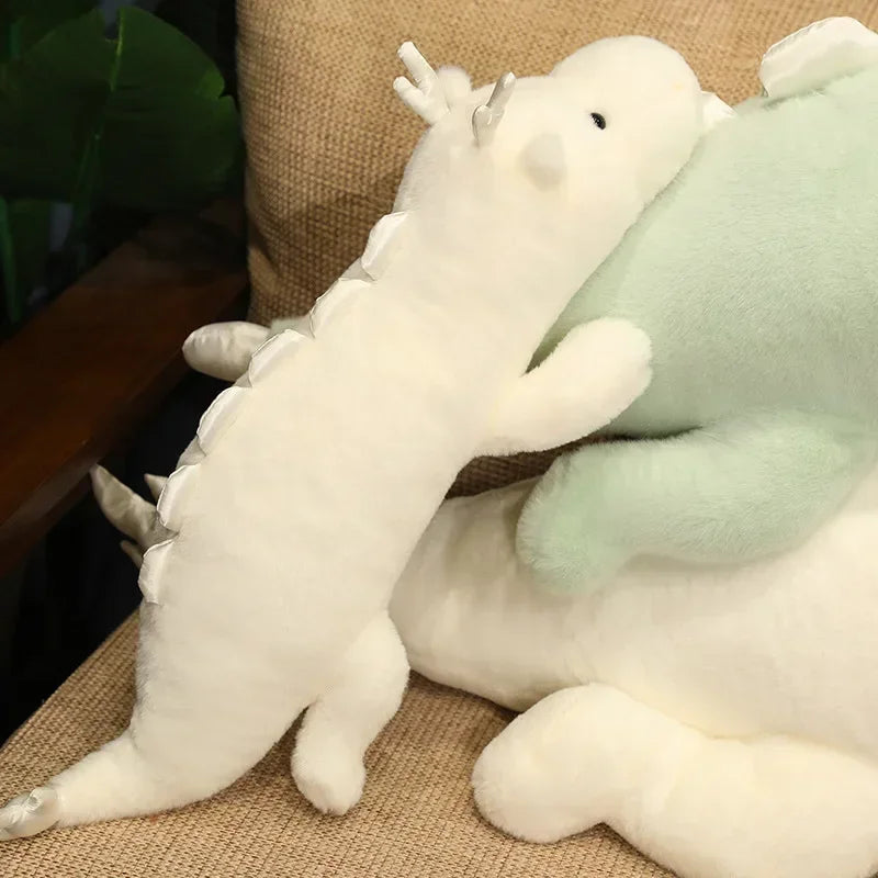 Kawaii push toy dragon on a textured surface