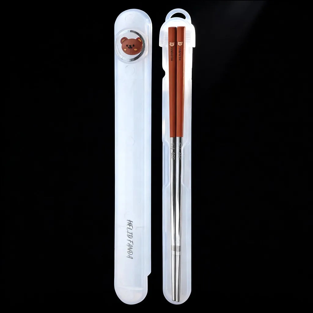 Set of metal kawaii chopsticks with a white case featuring a bear design on a black background