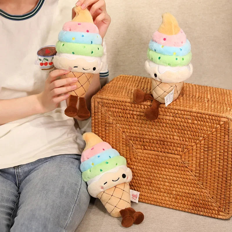 Person holding a kawaii plush ice cream toy next to two other plush ice cream toys on a woven basket.