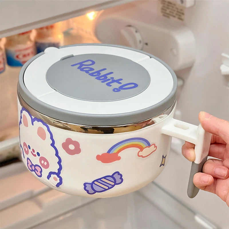A hand holding a white rabbit themed kawaii ramen bowl