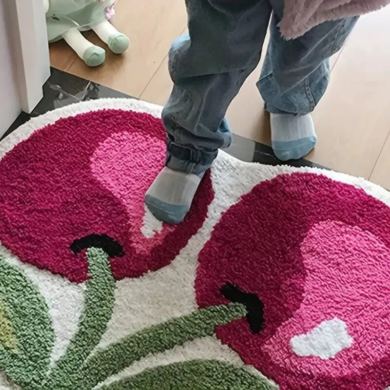Round kawaii rug with a floral design featuring pink flowers and green leaves, with a child's feet stepping onto it.