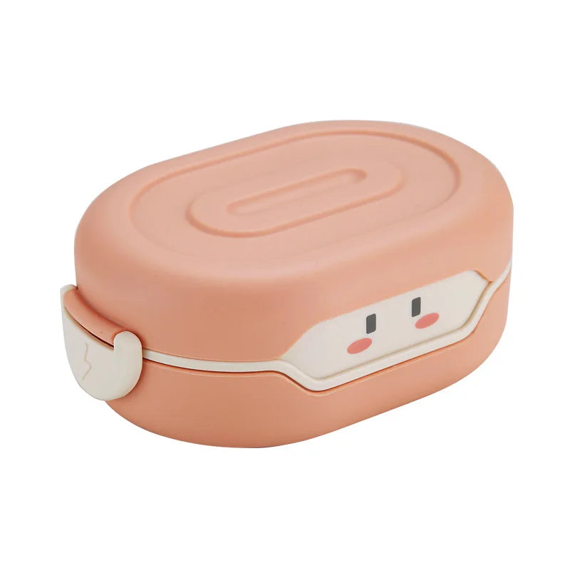 Pink kawaii lunch box with a cute face design on a white background