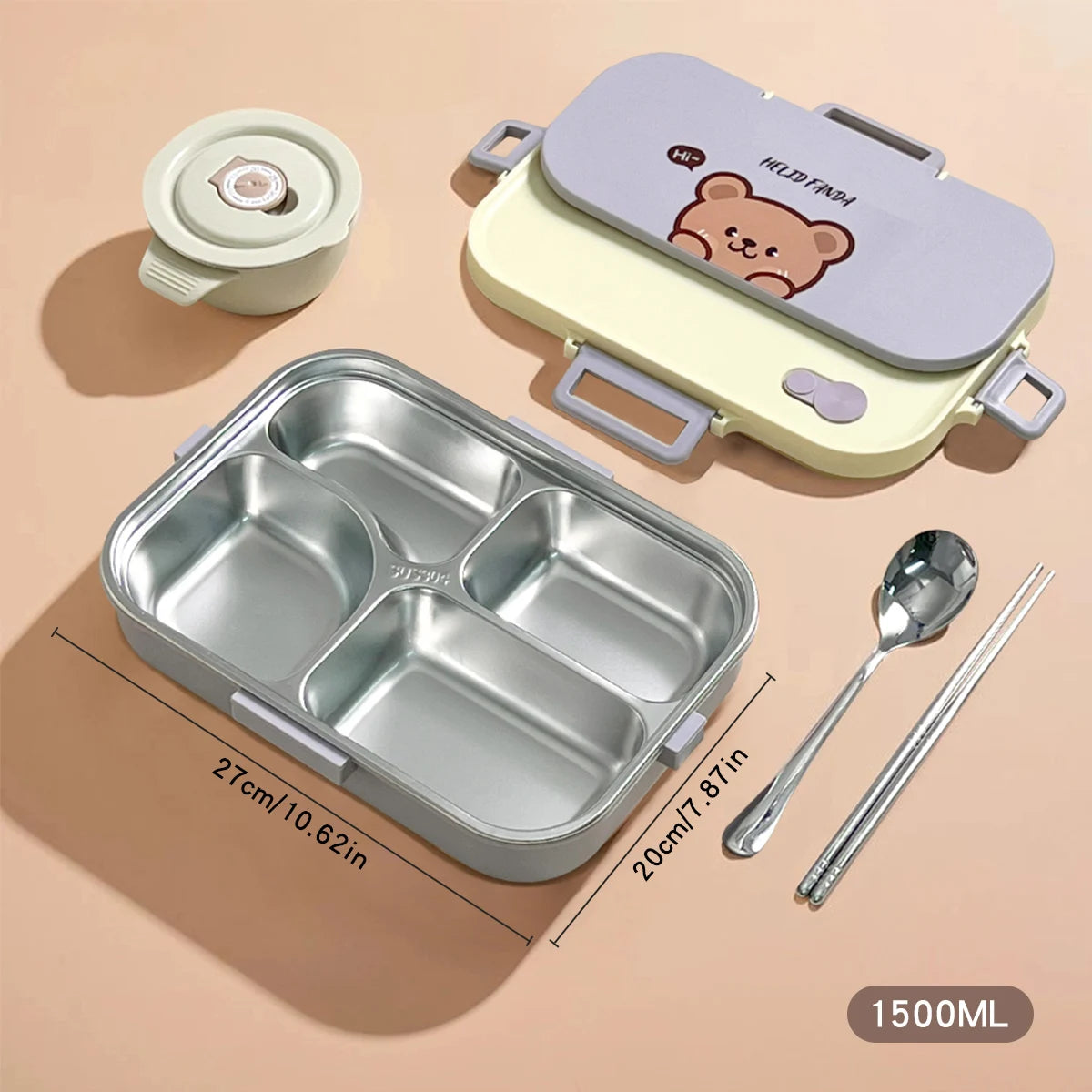 Stainless steel lunch box with kawaii bear design, thermos, and cutlery on a beige background