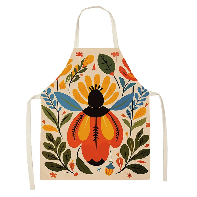Colorful kawaii apron with floral and insect design on a white background