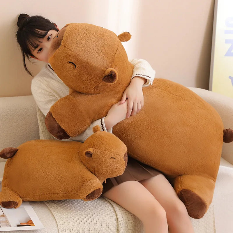 Child hugging a large brown kawaii teddy bear on a couch