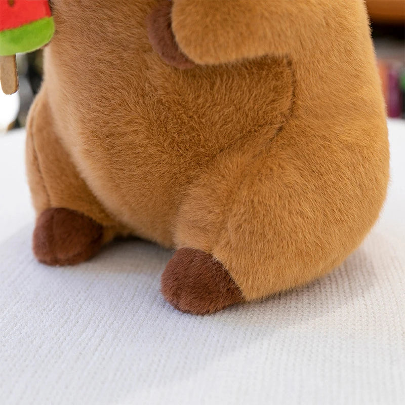 Close-up of a brown kawaii plush toy on a white surface