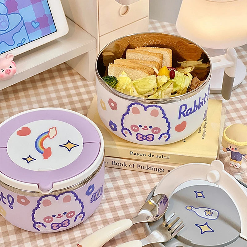 Children's kawaii ramen bowls with cartoon design, food inside, and cutlery on a checkered tablecloth.