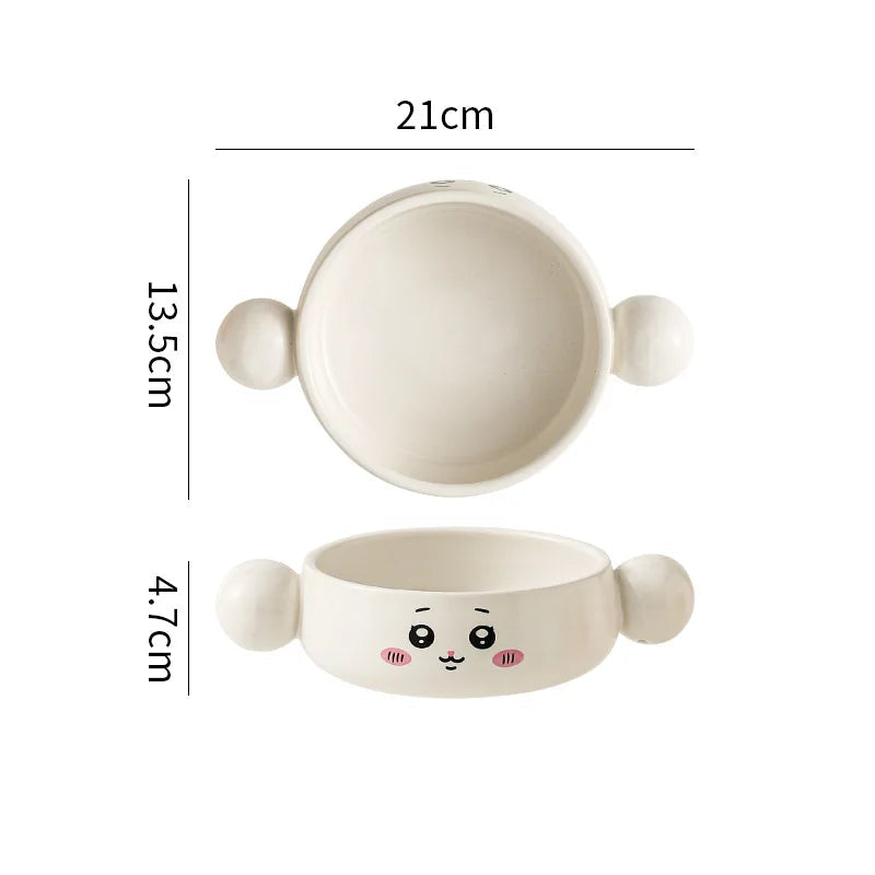 Ceramic kawaii ramen bowl with cartoon face design and measurements on a white background