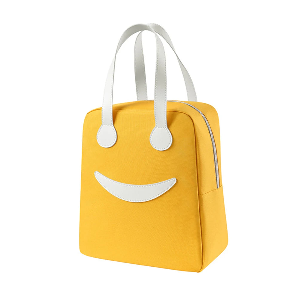 Yellow kawaii bag with a smiley face design on a white background