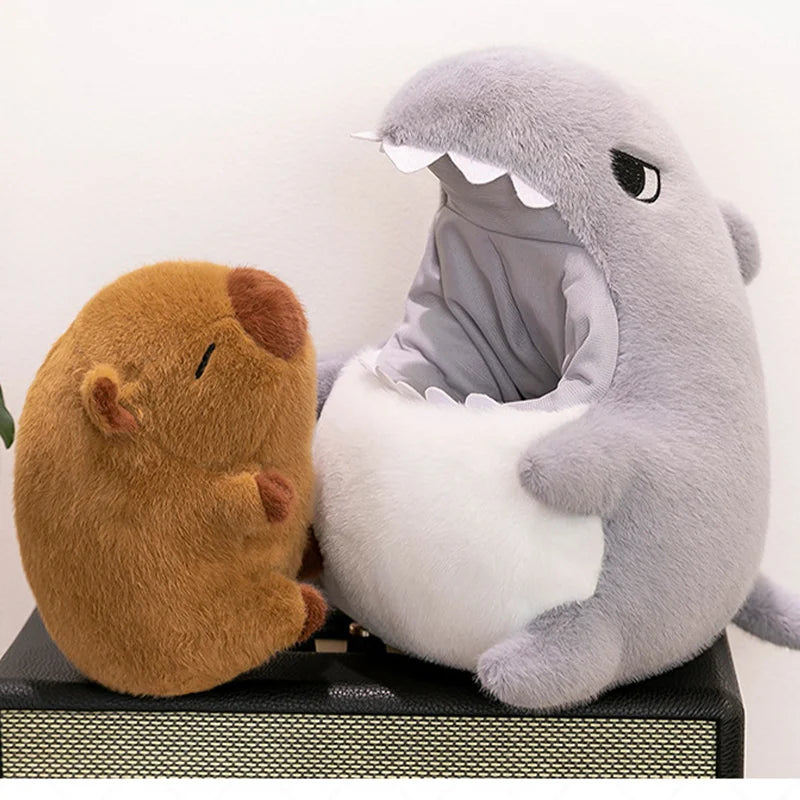 Two kawaii plush toys, one brown and one gray, on a white background