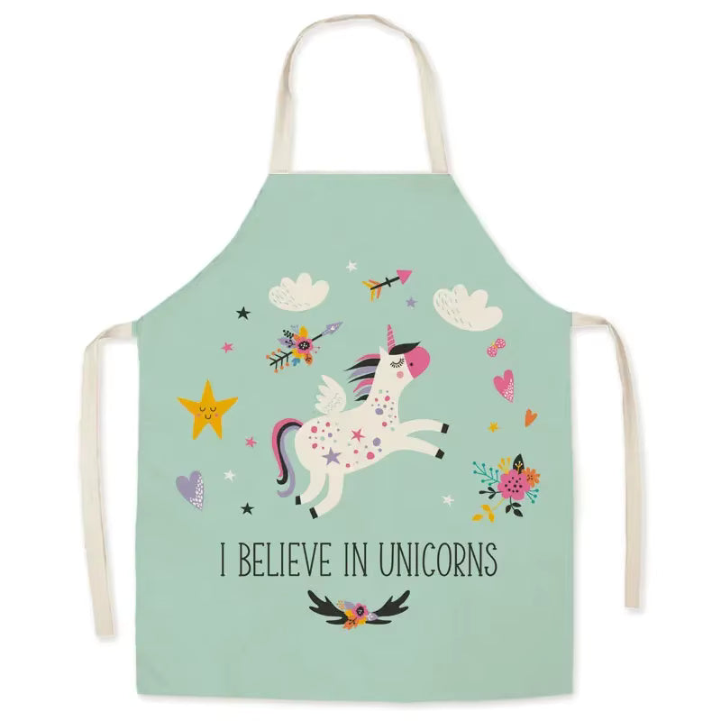 Children's kawaii apron with unicorn design and text on a light green background