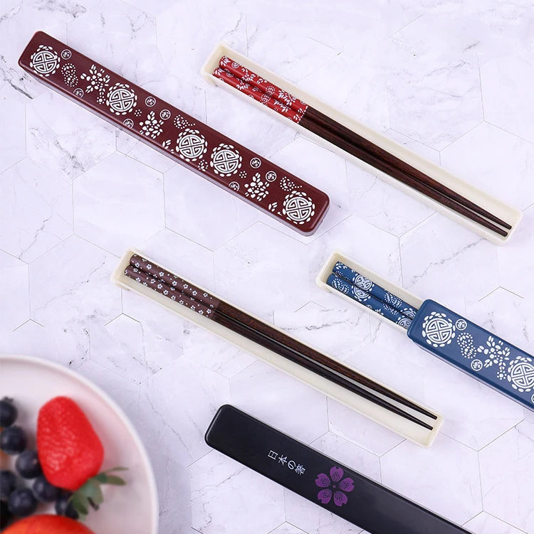 Set of kawaii chopsticks with decorative handles on a light background