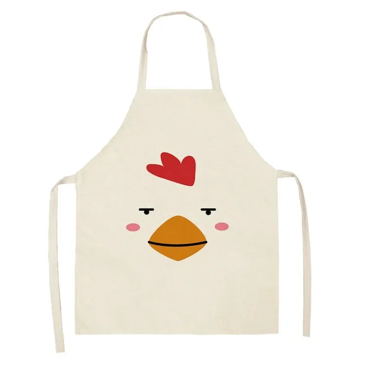 Beige kawaii apron with a cartoon chicken face design on a white background