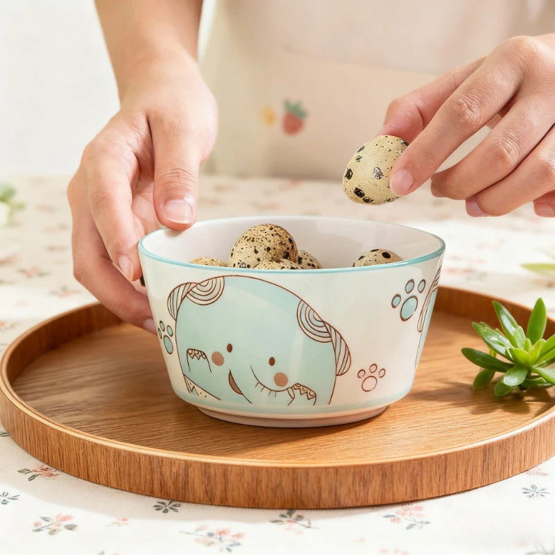 A kawaii bowl with a elephant designed on it