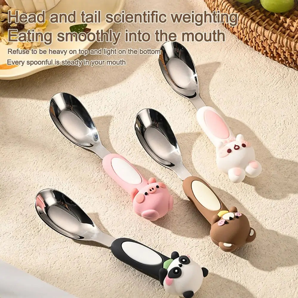 Set of four animal-themed kawaii spoons on a light surface with text about scientific weighting.