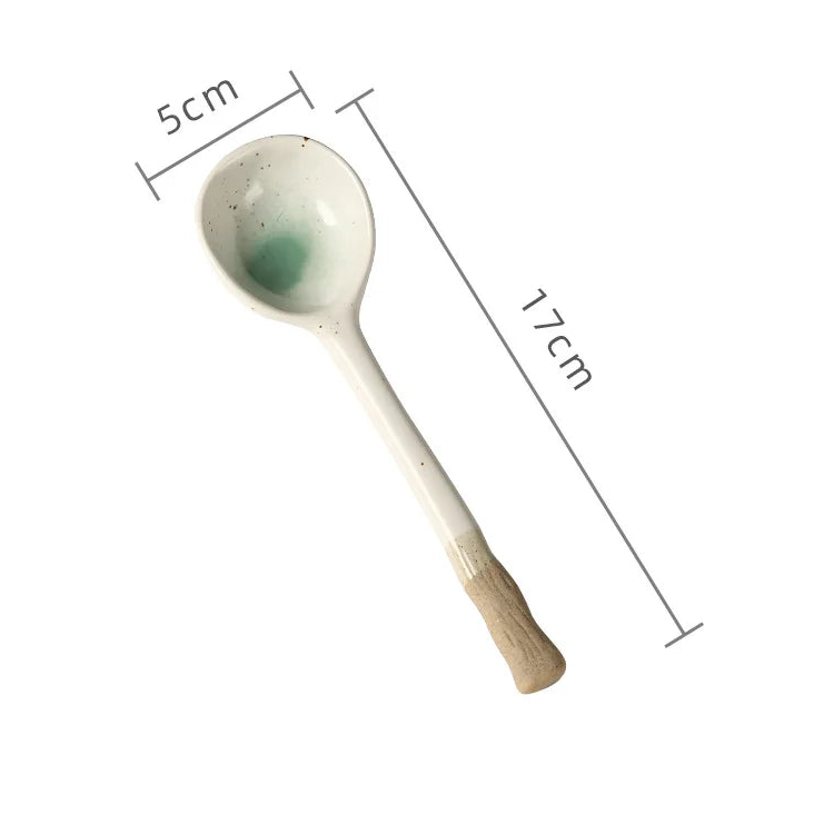 A white ceramic kawaii spoon with measurements