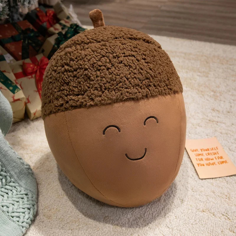 Acorn-shaped kawaii pillow with a face on a textured surface
