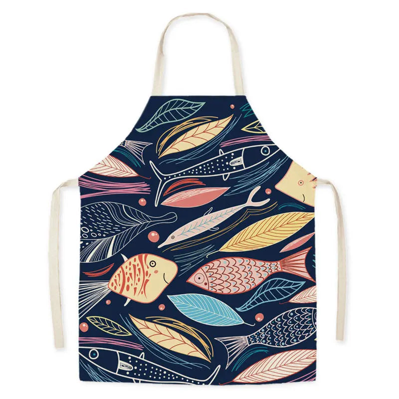 Colorful fish and leaf patterned kawaii apron on a white background