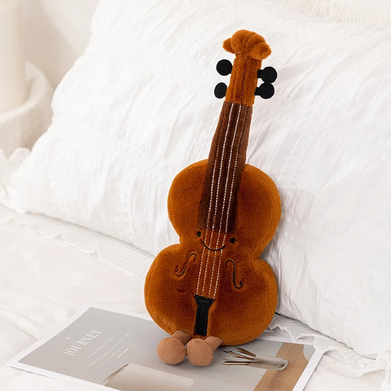 Kawaii plush toy shaped like a cello on a white surface