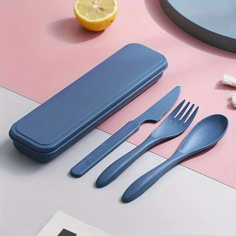 A set of blue kawaii utensils on a table