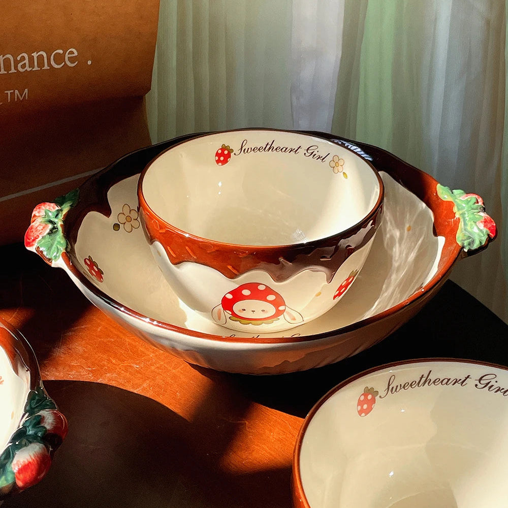 Ceramic kawaii ramen bowl with decorative handles on a wooden surface