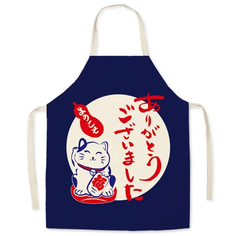 Navy blue kawaii apron with a lucky cat design and red text on a white background