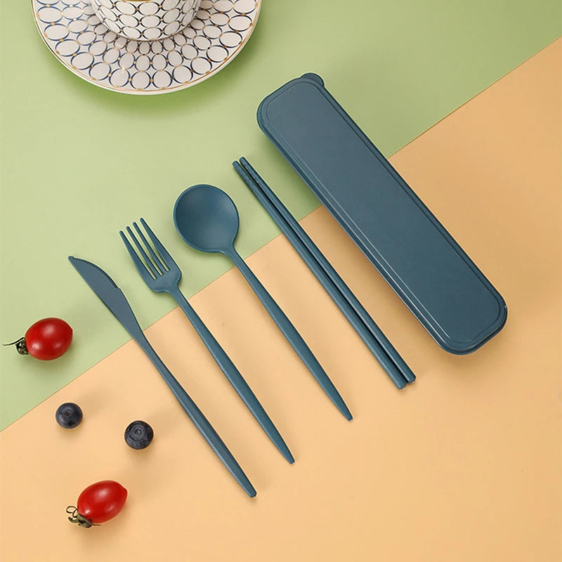 Kawaii blue cutlery set with case on a green and beige background