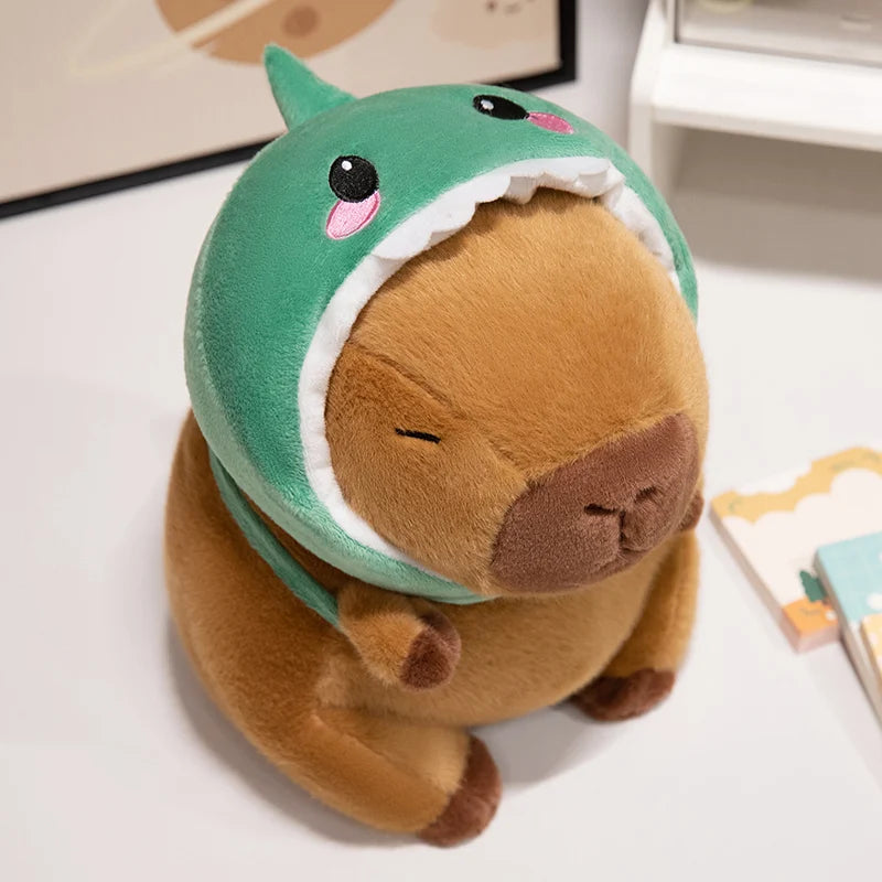 Kawaii plush toy with a green shell on a white surface
