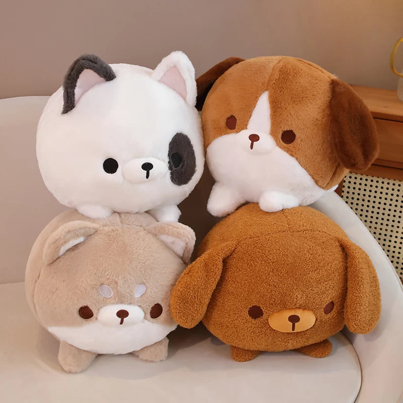 Four cute plush kawaii toys resembling a cat, dog, and two other animals on a light surface.