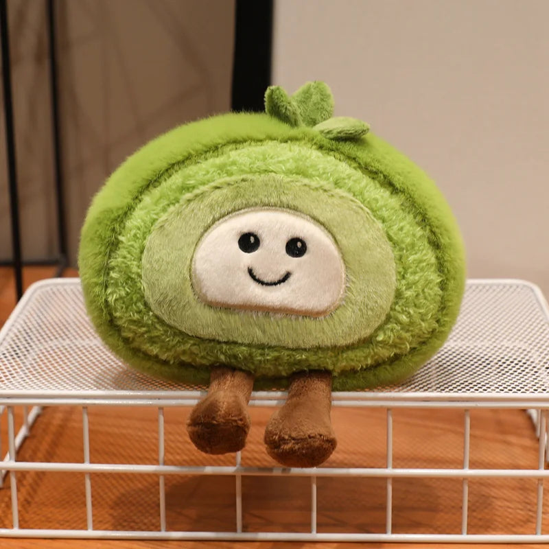 Green kawaii plush toy resembling a vegetable on a white surface