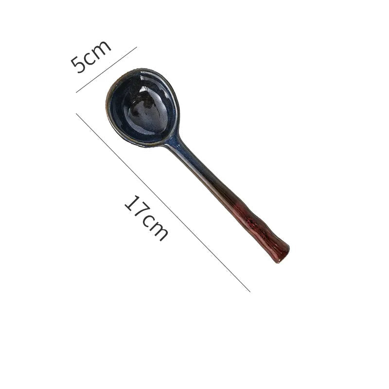 A blue designed kawaii spoon on a white background