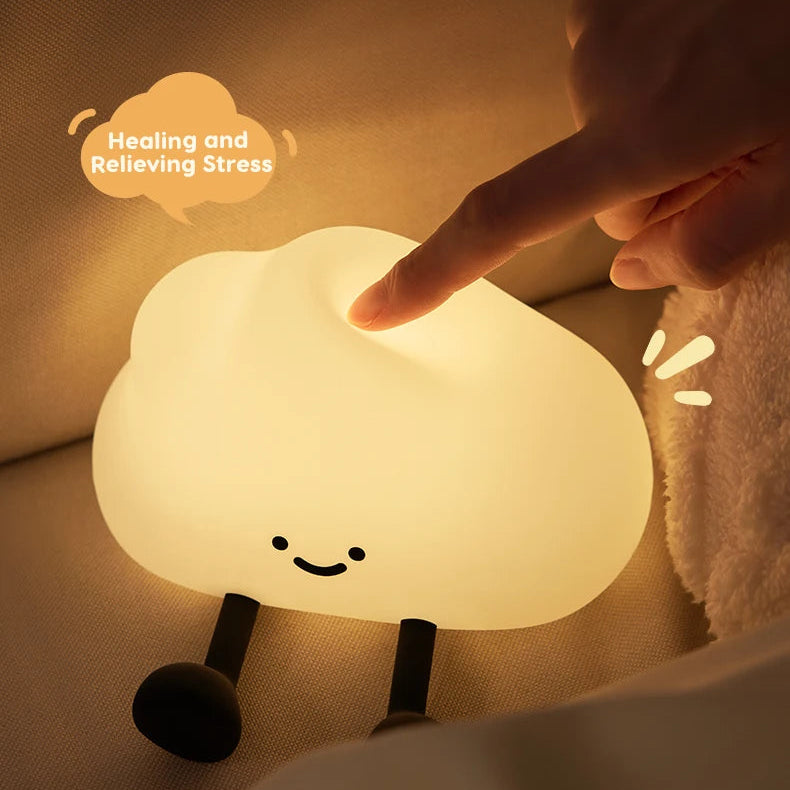 Cloud-shaped kawaii night light being touched by a hand with text about its features.