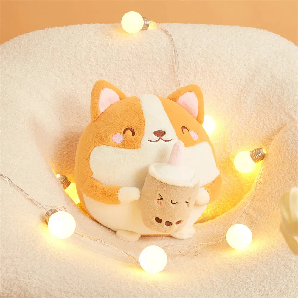 Corgi-shaped plush kawaii toy with a smaller cat plush toy inside, surrounded by string lights on a beige cushion.