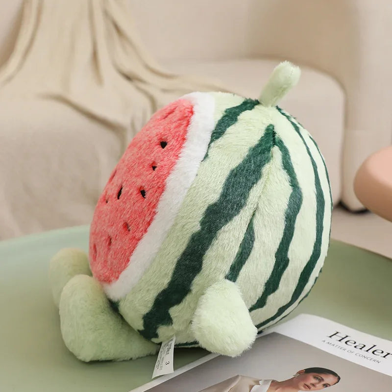 Kawaii plush toy shaped like a watermelon on a magazine with a blurred background