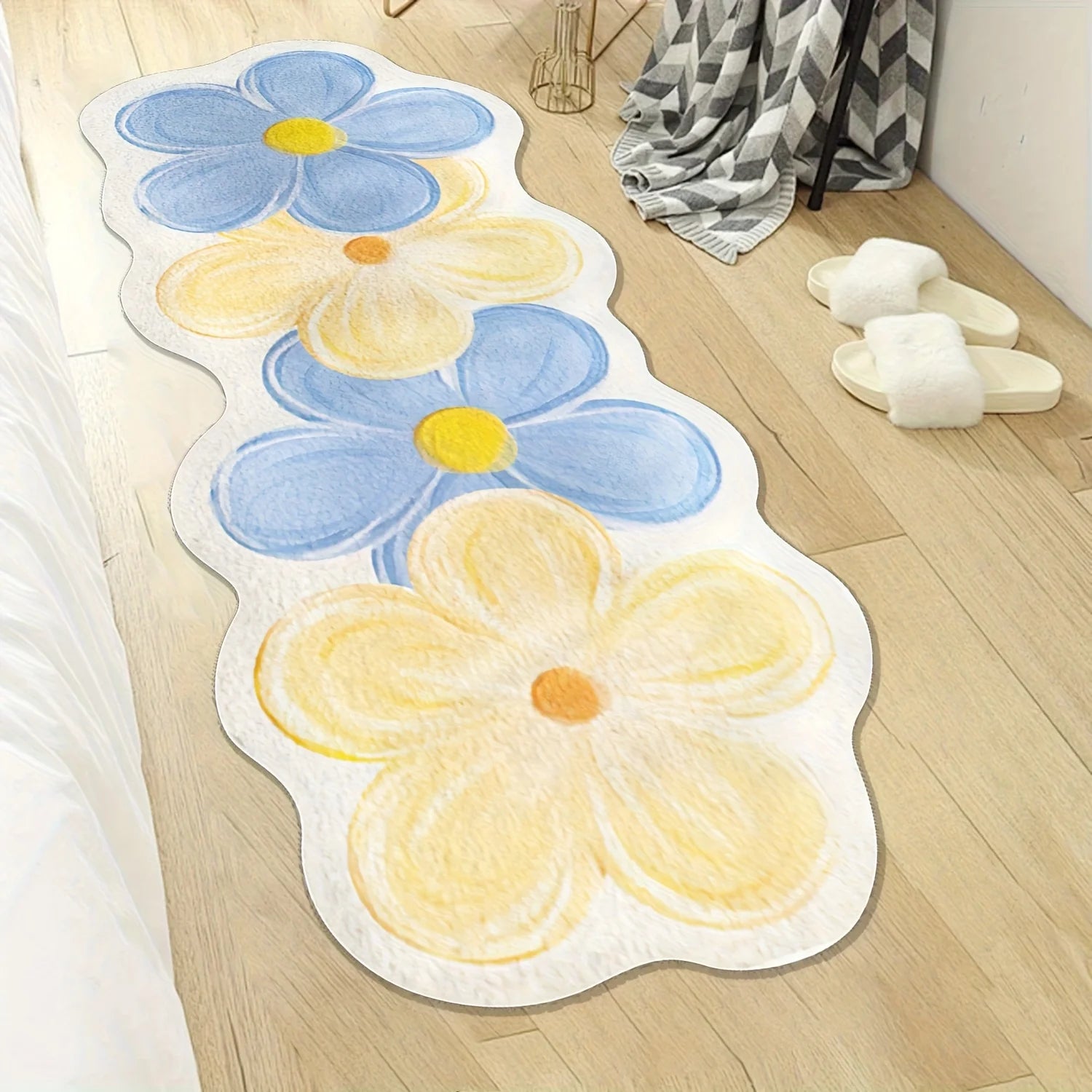 Floral design kawaii rug on a wooden floor with a chair and slippers in the background.