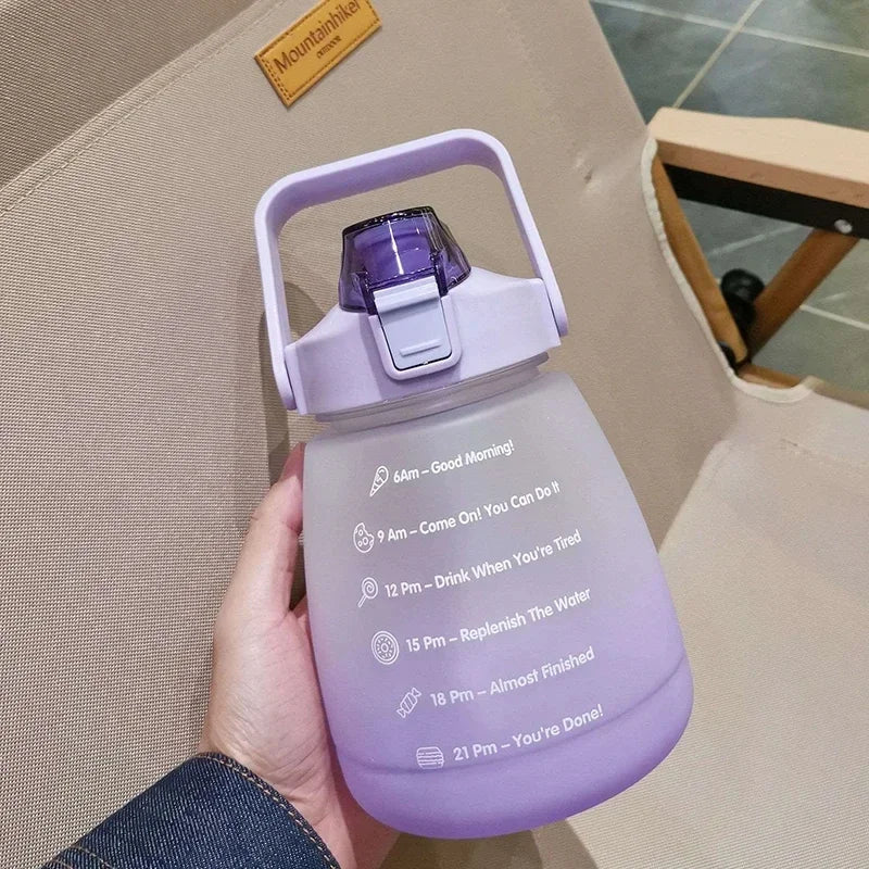 Purple kawaii water bottle with time markers held by a hand on a beige surface.