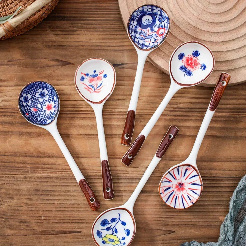 A group of ceramic kawaii spoons on a table