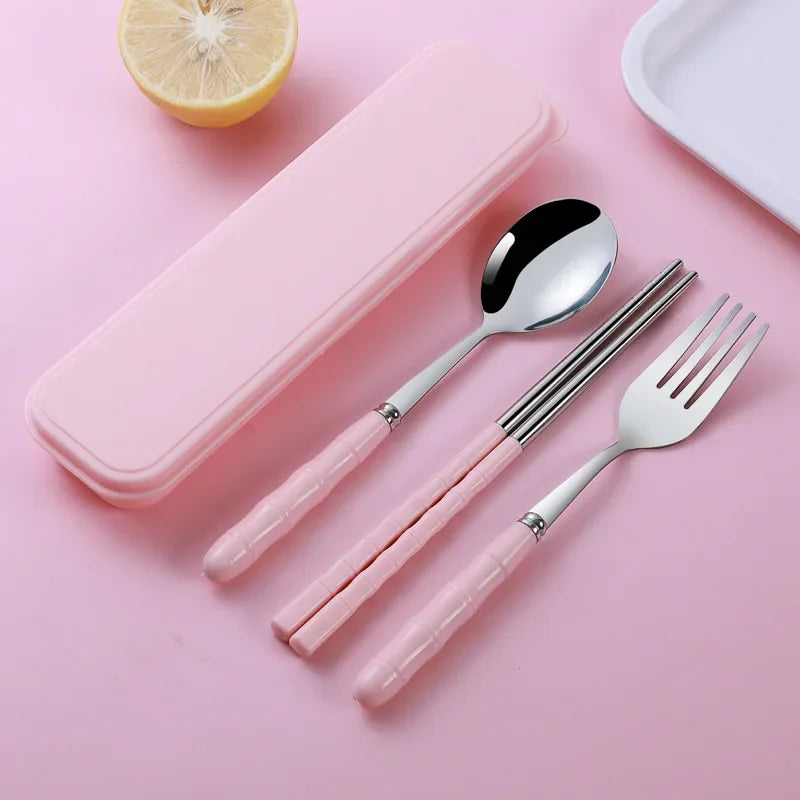 Pink kawaii utensils set with case on a pink background