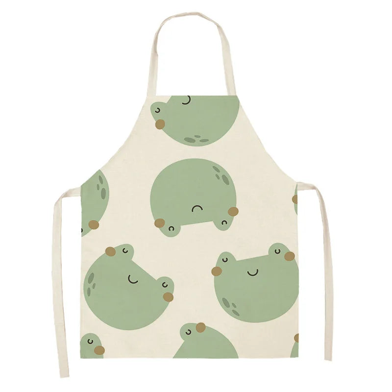 Kawaii apron with green frog pattern on a white background