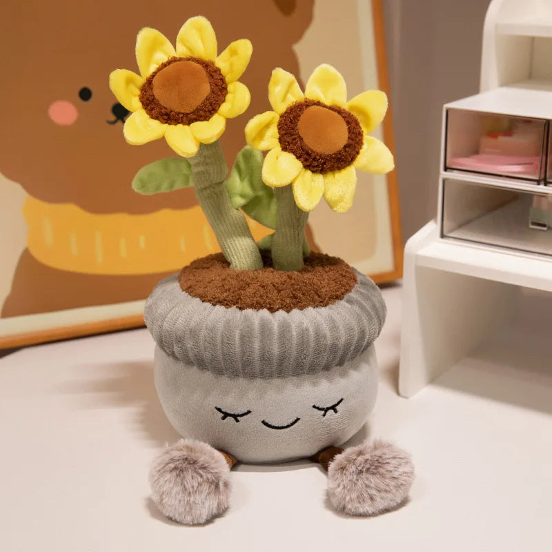 Plush kawaii toy resembling a potted plant with sunflower design on a surface.