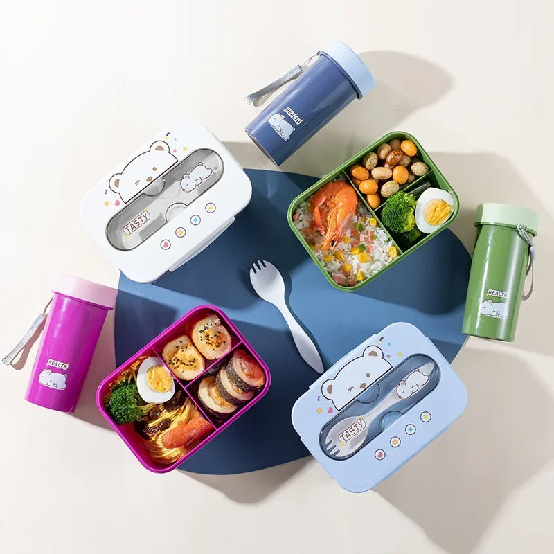Colorful kawaii lunch boxes and bottles with food on a blue tray