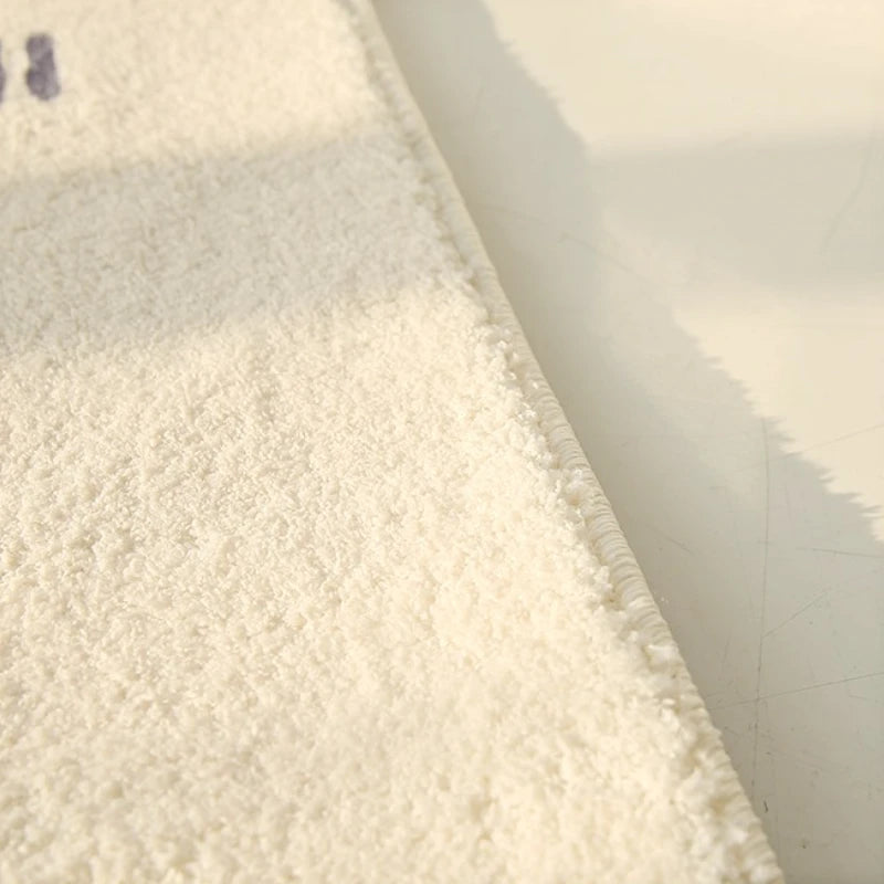 Close-up of textured white fabric of a kawaii rug