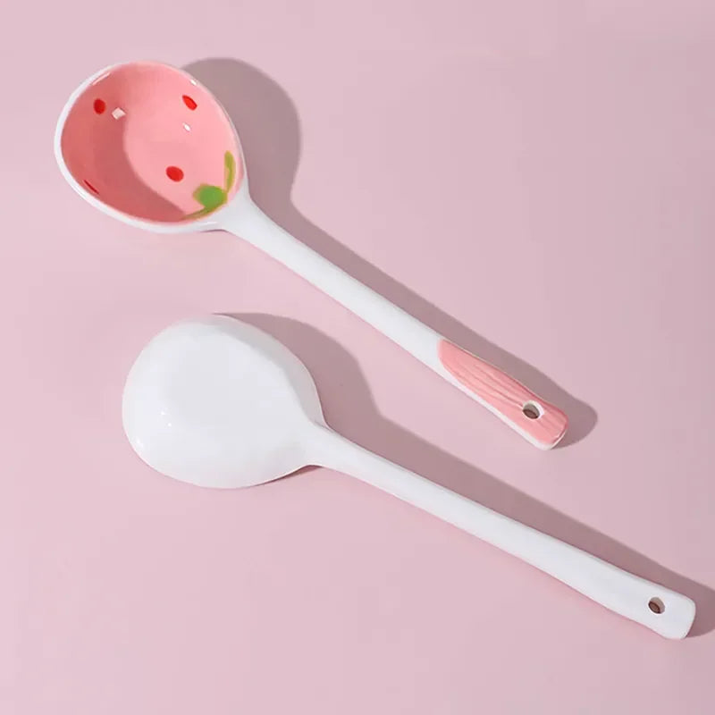 A strawberry designed kawaii spoons on a pink background