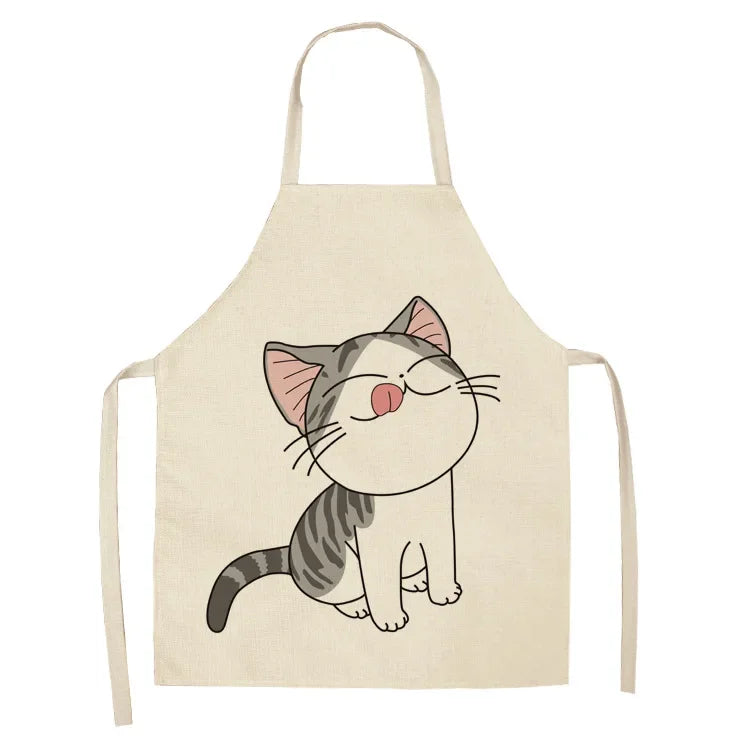 Beige kawaii apron with a cartoon cat design on a white background